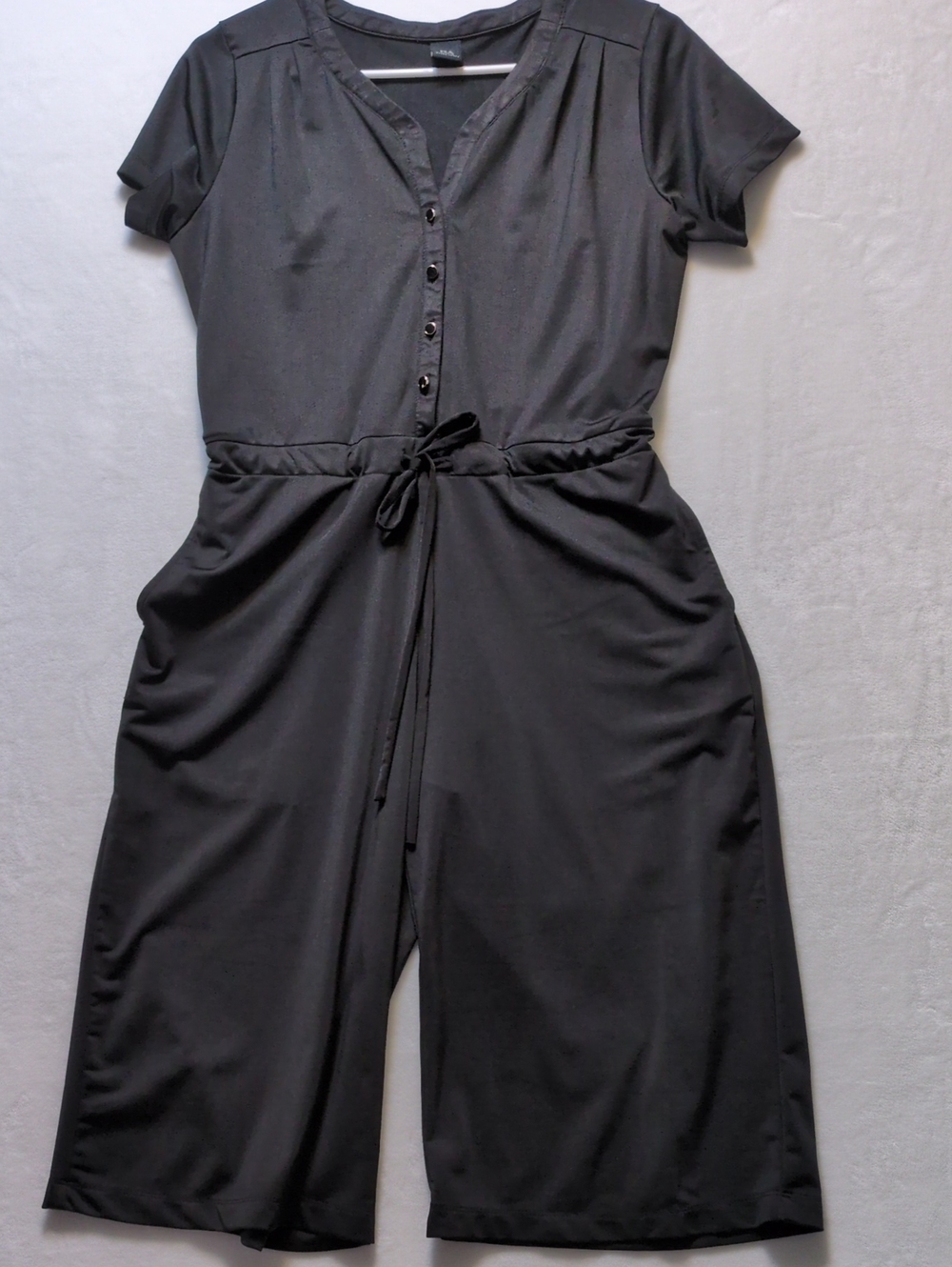 Bayo Black Wide Leg Jumpsuit XS Knit Stretch Short Sleeve Drawstring Henley